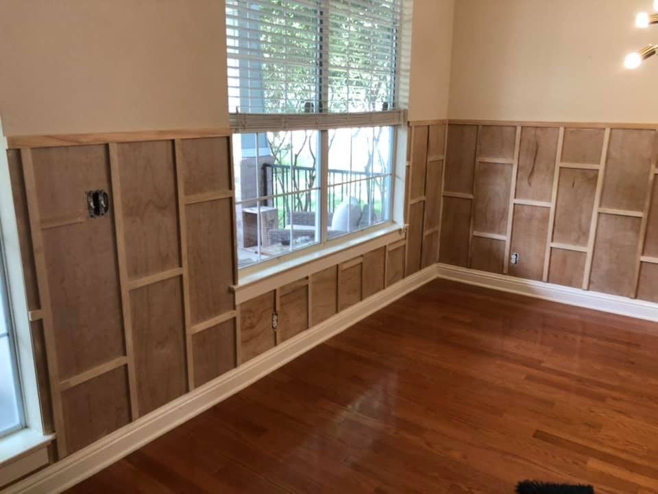Before: unpainted wood wainscoting